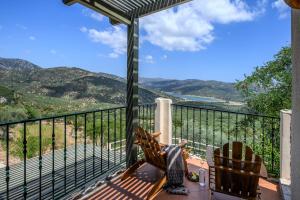 a balcony with a view of the mountains at Country Hotel Velani in Avdou