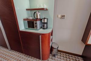Kuchyň nebo kuchyňský kout v ubytování VacationClub - Marine Hotel Apartament 214