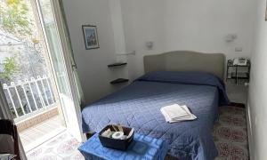 Postel nebo postele na pokoji v ubytování Hotel Europa