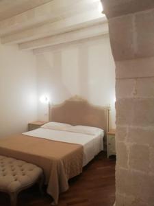 Postel nebo postele na pokoji v ubytování Hotel Gargallo