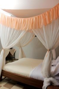 Voodi või voodid majutusasutuse Sweet Lake Resort toas