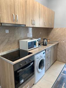 A kitchen or kitchenette at CENTER APARTMENT PLOVDIV