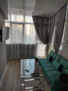A seating area at CENTER APARTMENT PLOVDIV
