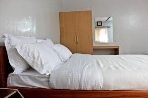 Postel nebo postele na pokoji v ubytování Sweet Lake Resort