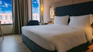 Postel nebo postele na pokoji v ubytování Radisson Blu Hotel Toulouse Airport