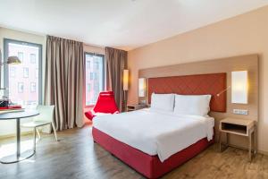 Postel nebo postele na pokoji v ubytování Radisson Blu Hotel Toulouse Airport