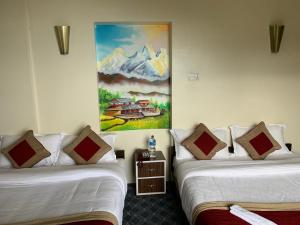 Hotel Sakura Durbarにあるベッド