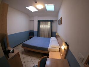 Letto o letti in una camera di Albergo La Caravella