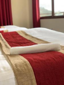 Hotel Sakura Durbarにあるベッド