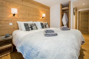 Ένα ή περισσότερα κρεβάτια σε δωμάτιο στο Chalet Lumina