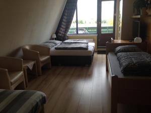 Postel nebo postele na pokoji v ubytování B&B-Edam