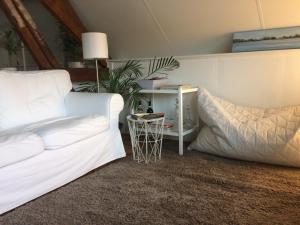 Posezení v ubytování B&B In de Oude Smederij Zaltbommel