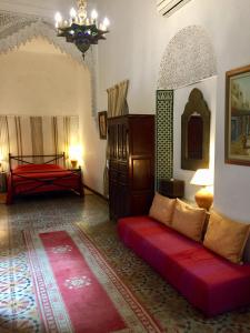 Voodi või voodid majutusasutuse Riad A La Belle Etoile toas