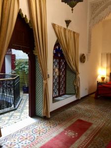 Voodi või voodid majutusasutuse Riad A La Belle Etoile toas