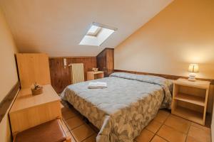 Tempat tidur dalam kamar di Dimora Fresilia Casa Vacanze