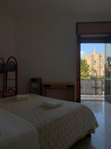 Postel nebo postele na pokoji v ubytování Hotel Apollo