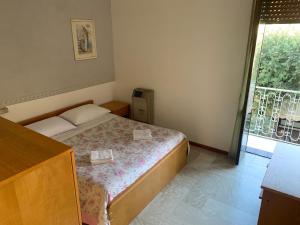 Postel nebo postele na pokoji v ubytování Hotel Apollo