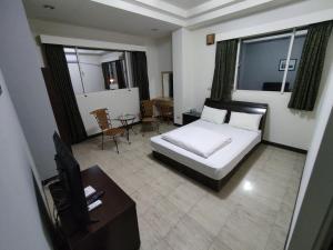 Katil atau katil-katil dalam bilik di 鴻景山莊民宿 b&B