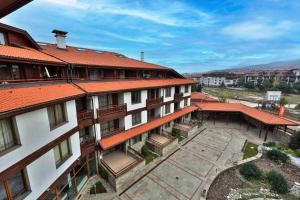 an overhead view of a building with an orange roof at Bellevue Residence Apartments in Bansko