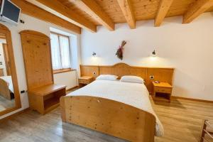 Postel nebo postele na pokoji v ubytování Room & Breakfast Cà mea Dina