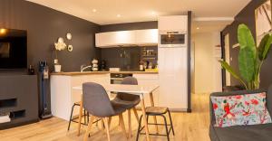 Kuchyň nebo kuchyňský kout v ubytování Appartement Le Labes