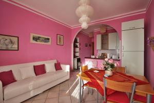 a living room with a couch and a table at Stella Del Sud in Cuglieri