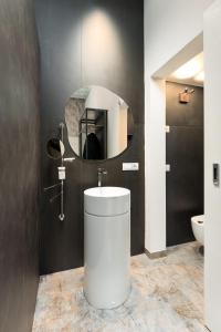 Koupelna v ubytování F1RST Suite Apartment & SPA