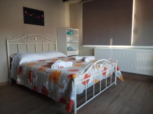 Postel nebo postele na pokoji v ubytování Studiο_loft