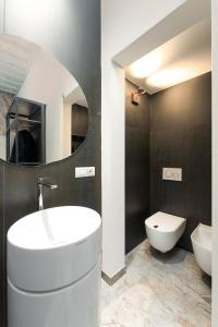 Koupelna v ubytování F1RST Suite Apartment & SPA