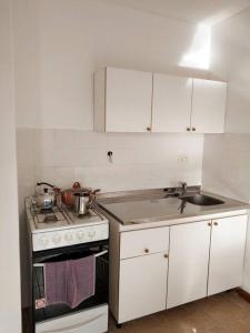 Kuchyň nebo kuchyňský kout v ubytování Apart Estepa