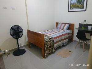 Llit o llits en una habitació de Brazilian's House - Agradable casa amoblada
