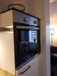 Η κουζίνα ή μικρή κουζίνα στο Apartment Luxus "Akzente-Art Minden"