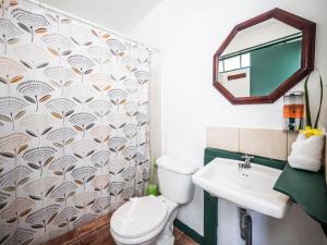 a bathroom with a toilet and a sink at La Puesta del Sol B&B in Carrillo +141 photos