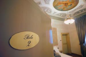 Posteľ alebo postele v izbe v ubytovaní Residenza Palazzo Negri