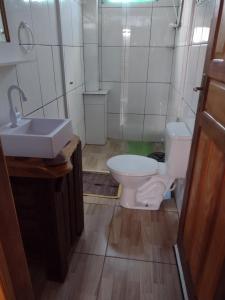 Ein Badezimmer in der Unterkunft Pousada Morada do Sol