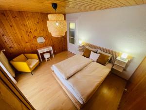 Katil atau katil-katil dalam bilik di Serpolet - Chalet 6 personnes - Sauna