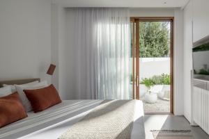 Postel nebo postele na pokoji v ubytování Villa Mimaze Minimalist Living + 32 fotografií