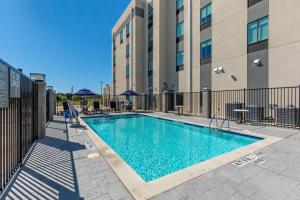 The swimming pool at or close to Comfort Inn & Suites Balch Springs - SE Dallas