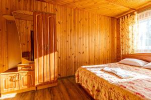 Postel nebo postele na pokoji v ubytování Smerichka