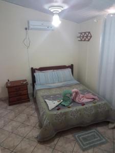 Postel nebo postele na pokoji v ubytování Pousada e Hostel Chapada Suites