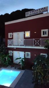 Bazén v ubytování Hostal Alhaja Playa nebo v jeho okolí