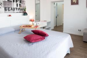 Postel nebo postele na pokoji v ubytování Le terrazze di casa Bonelli