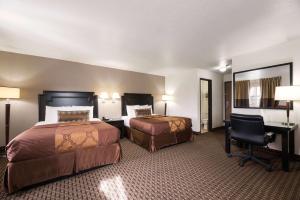 Ένα ή περισσότερα κρεβάτια σε δωμάτιο στο Econo Lodge Inn & Suites Williams - Grand Canyon Area