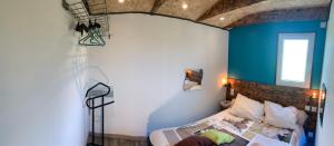 Postel nebo postele na pokoji v ubytování T1, spa privé accès piscine sauna