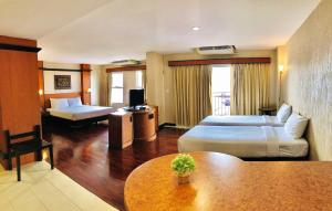 Fotografie z fotogalerie ubytování Piyada Residence By TecHotels - Guest Friendly - Near to Beach, Famous Walking Street - Night Clubs , Bars & Discos v destinaci Pattaya South