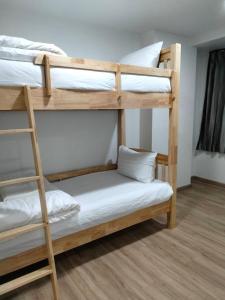 Ένα ή περισσότερα κρεβάτια σε δωμάτιο στο K2Green Hotel