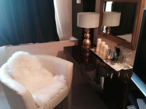 Voodi või voodid majutusasutuse Hotel Consul toas