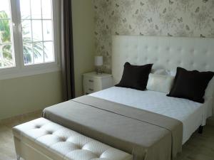 Posteľ alebo postele v izbe v ubytovaní Hotel Villaclara