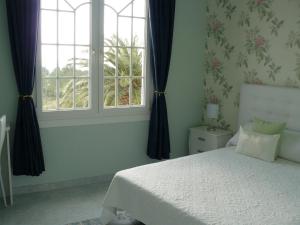Posteľ alebo postele v izbe v ubytovaní Hotel Villaclara