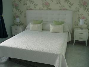 Posteľ alebo postele v izbe v ubytovaní Hotel Villaclara